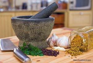 Spices 2 Kitchen scene showing a pestle and mortar and spices